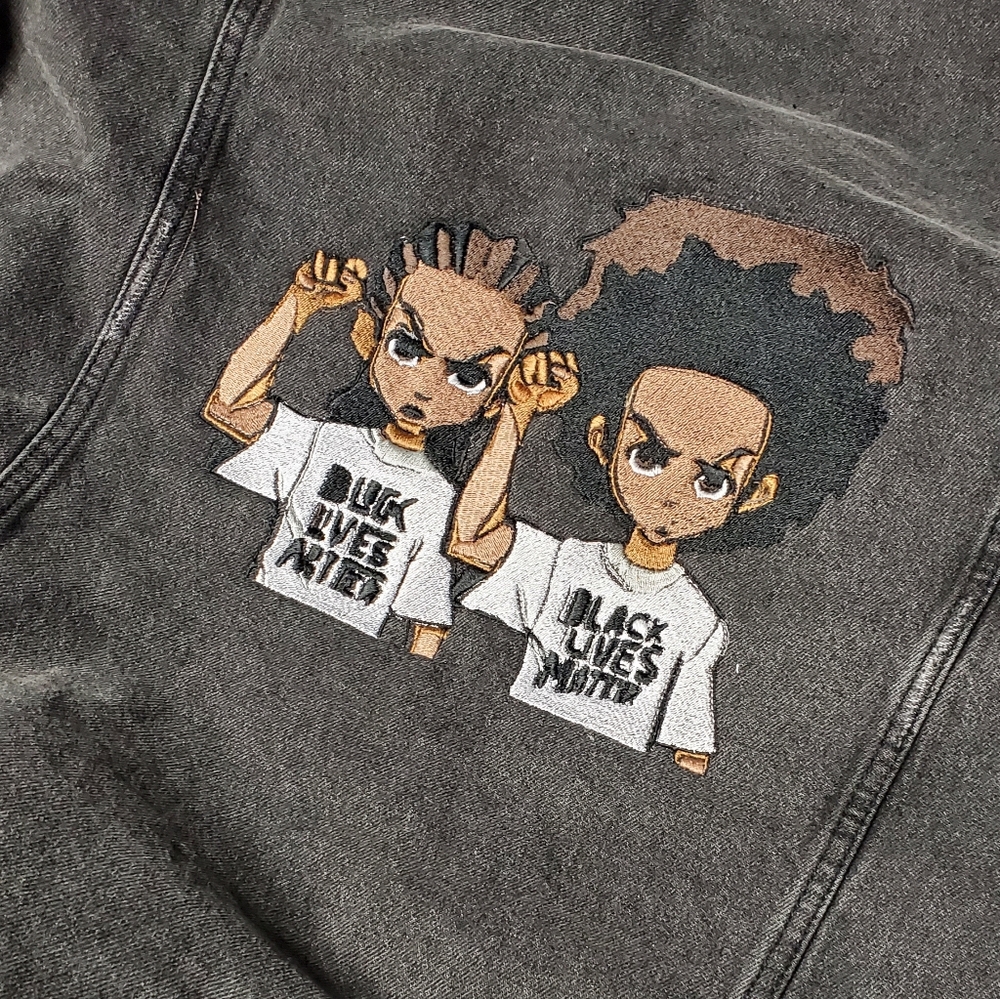 Custom embroidered Boondocks on denim jacket